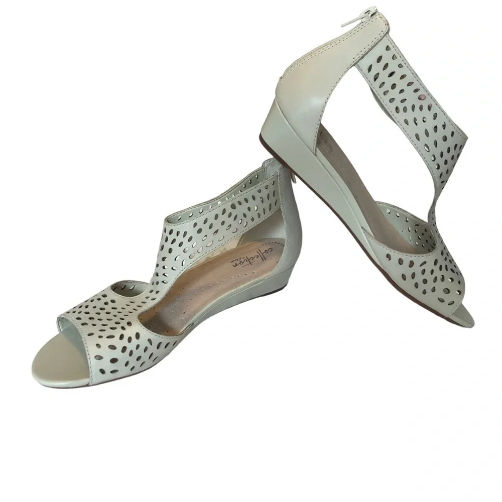 Collection by Clark’s. Abigail Ruby in Ivory. Perforated leather‎ wedges. 8.5